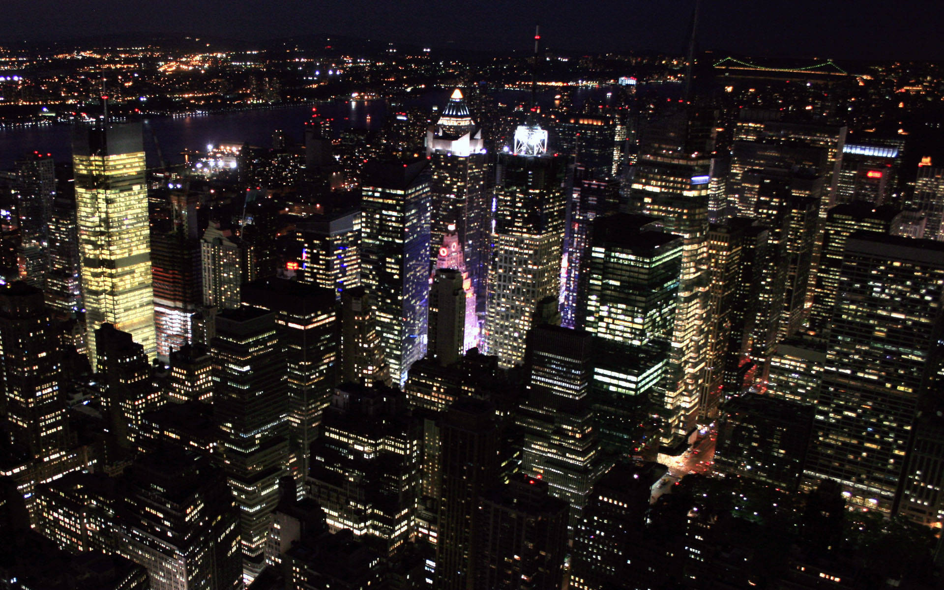 Modern Tall Building New York City At Night Wallpaper