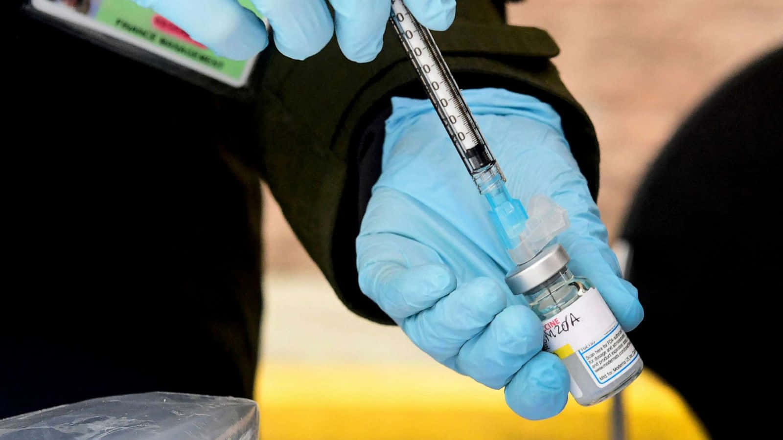 Moderna Covid-19 Vaccine Syringe Background