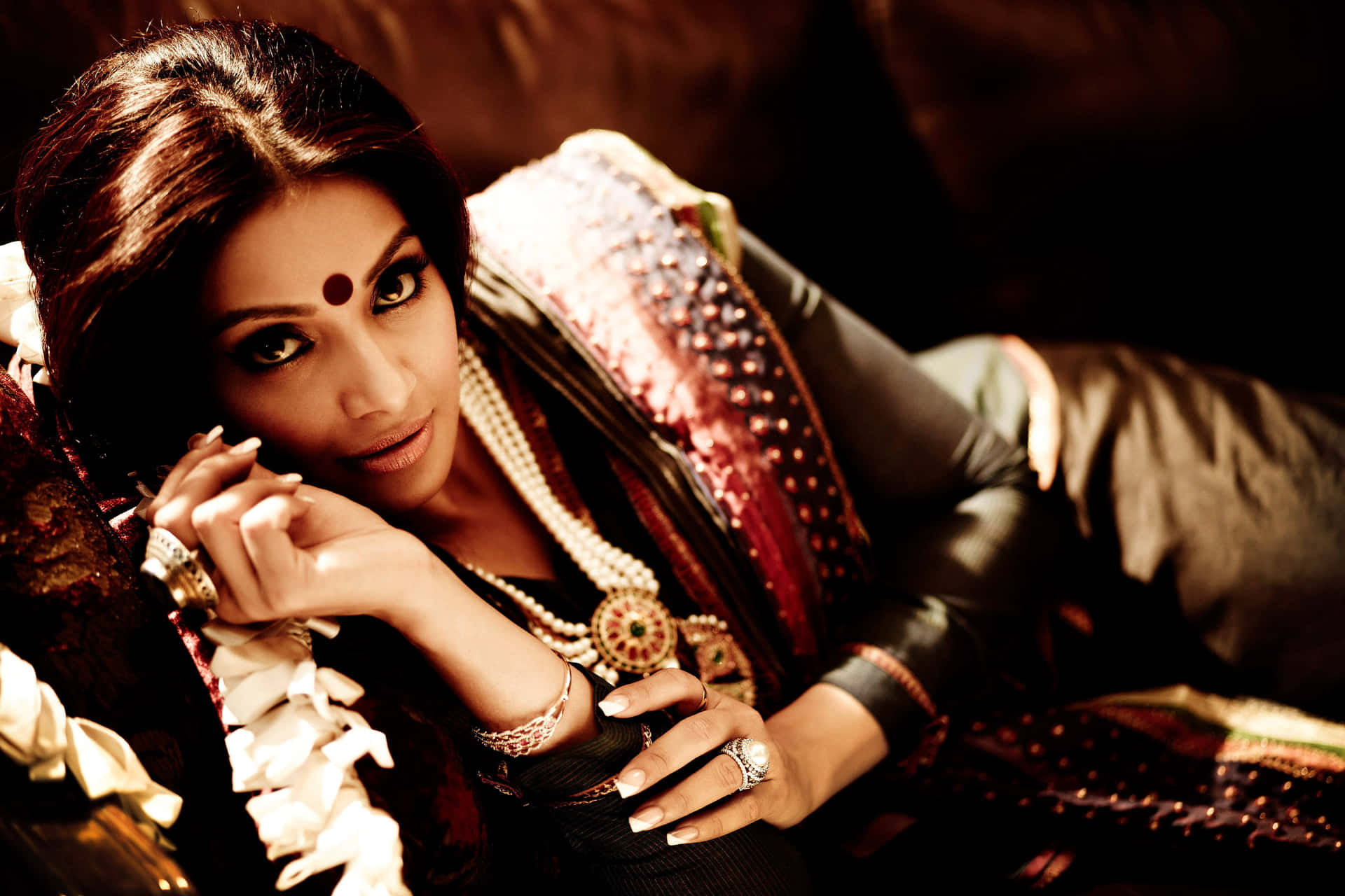 Serene Elegance: A Portrait of a Modest Indian Woman Wallpaper