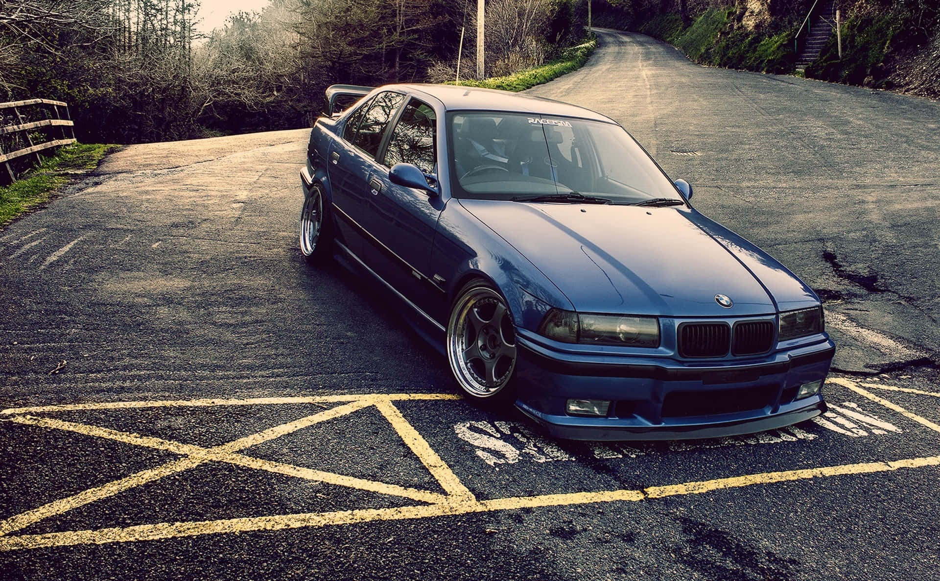 Modified B M W E36 Coupe On Roadside Wallpaper