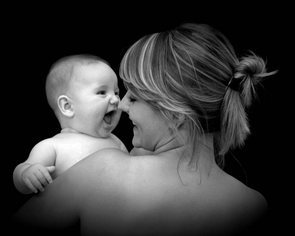 Mom and Son Laughing Black and White Wallpaper