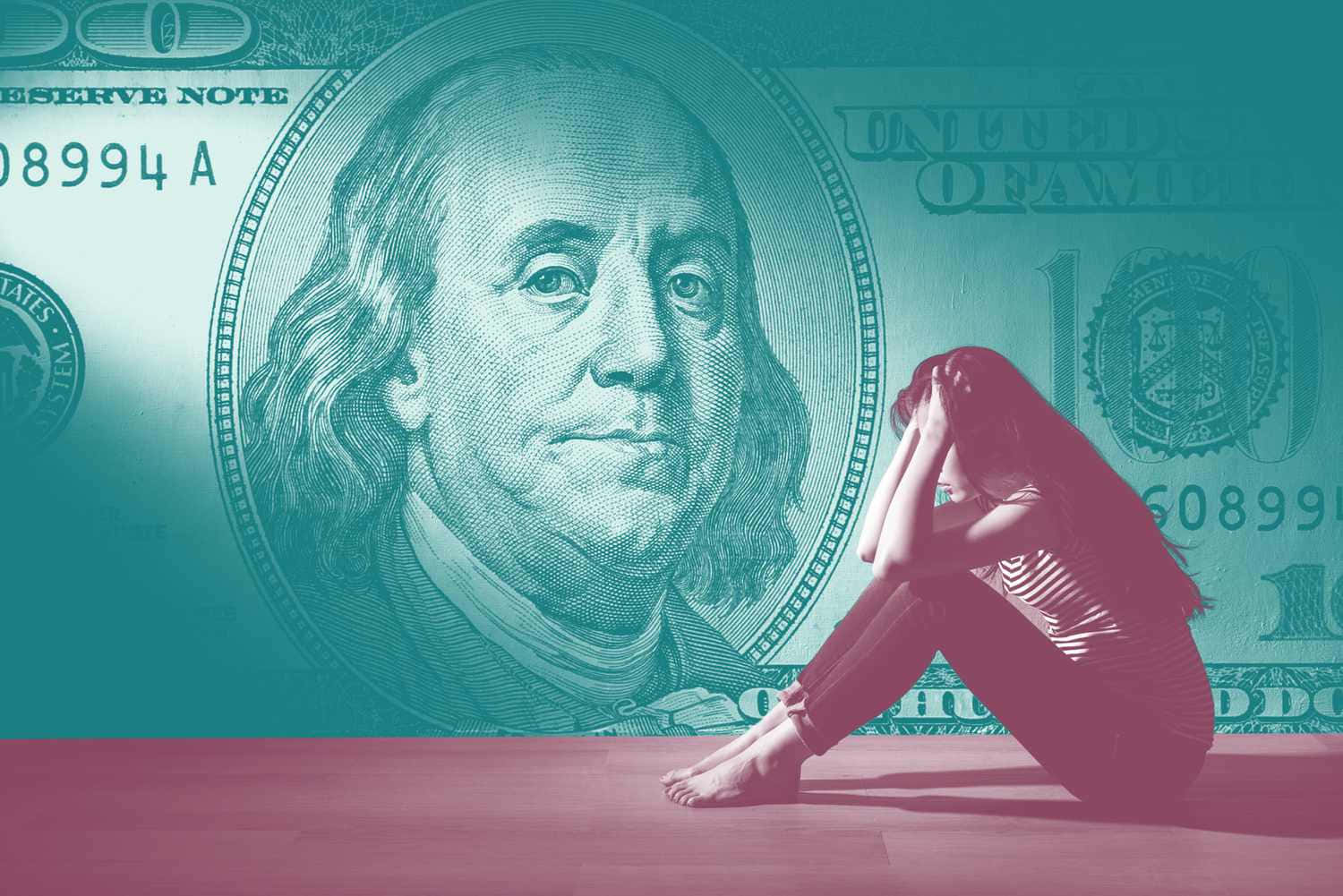 A Woman Sitting On The Floor In Front Of A Dollar Bill
