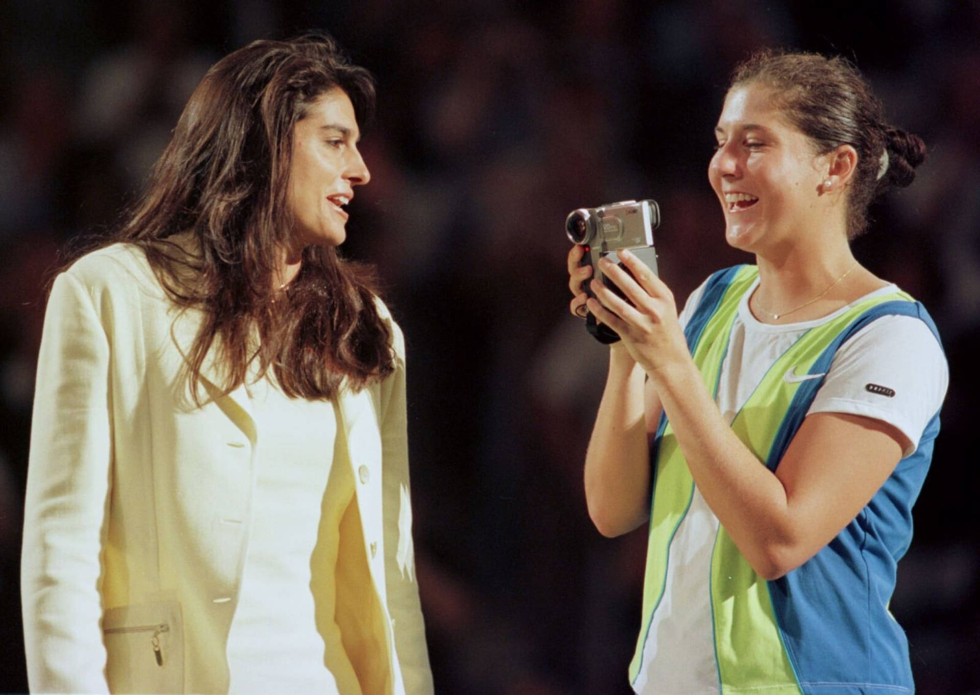 Monica Seles Filming And Laughing Wallpaper