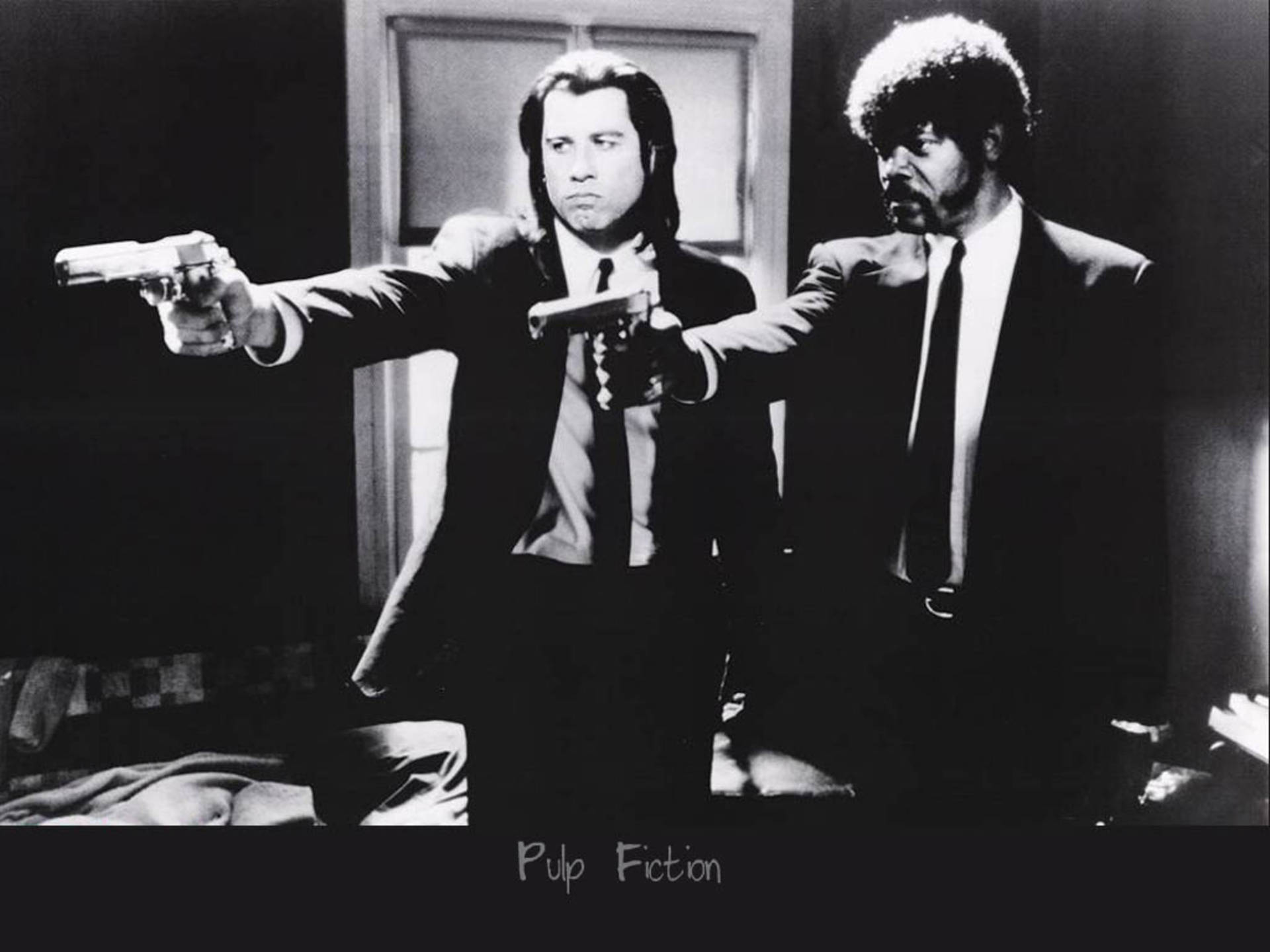 Iconic Duo Vincent and Jules from Pulp Fiction in a Monochromatic Shot Wallpaper