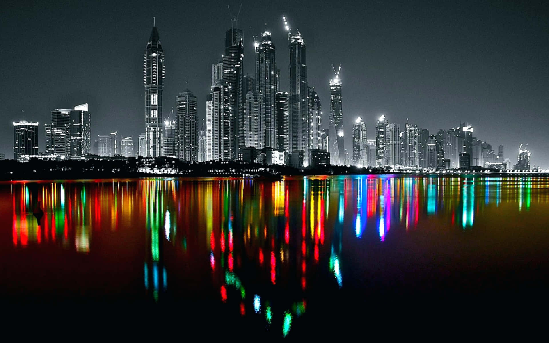 Monochrome Cityscapewith Colorful Reflections Wallpaper