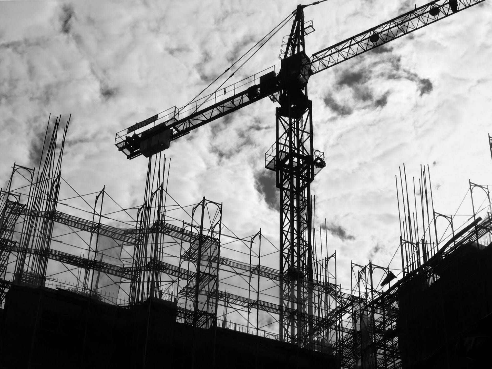 Monochrome Of Construction Crane Operator Wallpaper