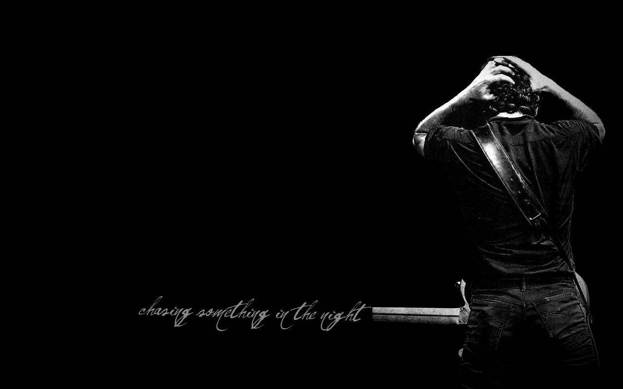 Black and white portrait of Bruce Springsteen, iconic American songwriter and musician. Wallpaper