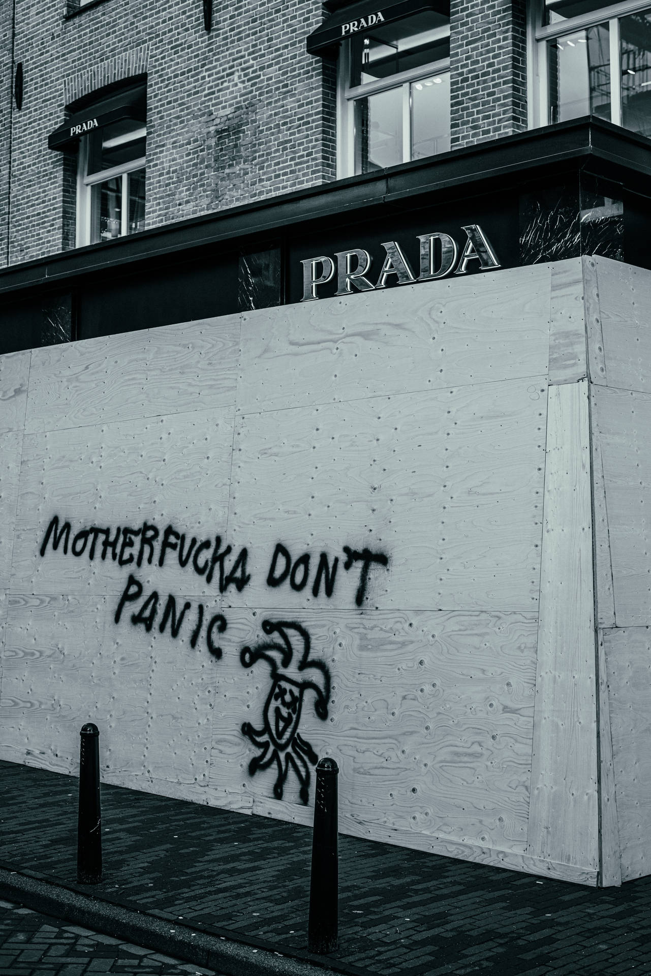 Monochrome Prada Store Graffiti Wallpaper
