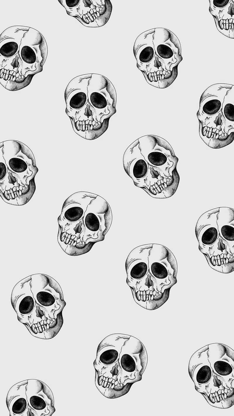 Monochrome_ Skull_ Pattern_ Background Wallpaper