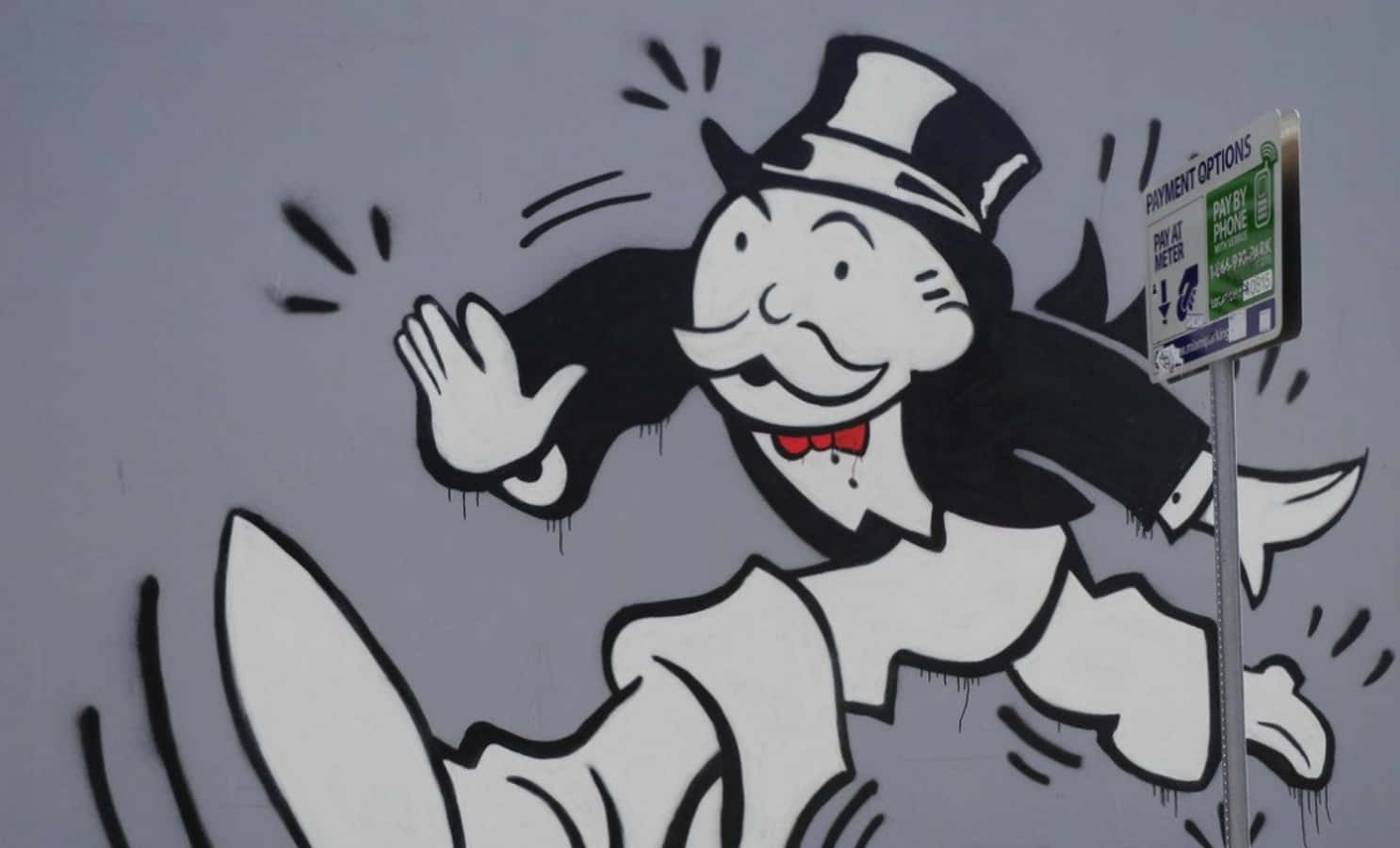 Roll the dice and take a chance on being a millionaire with Monopoly Man