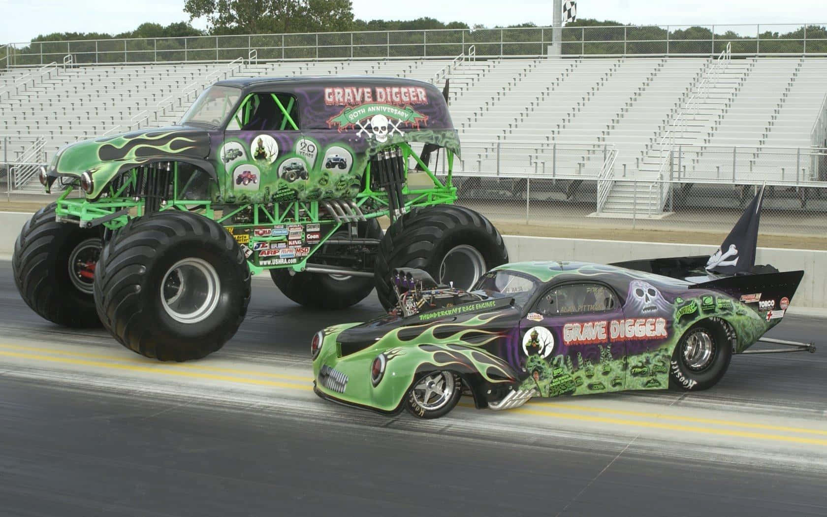 A Monster Truck And A Car With Monster Truck On It