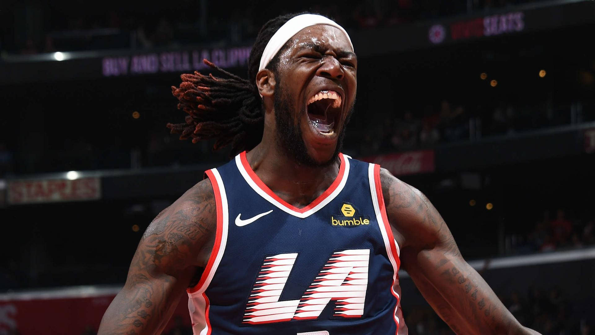 Montrezl Harrell in a display of passion during a game Wallpaper