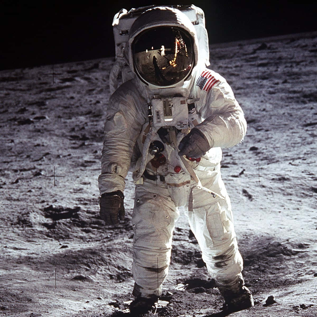 A Man In A Space Suit Walking On The Moon