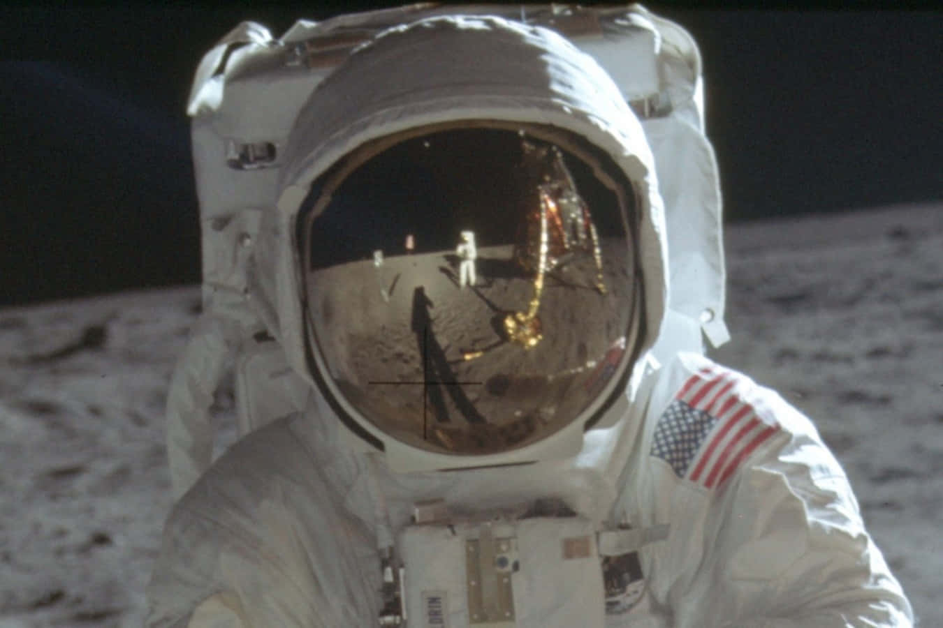 A Man In A Space Suit Is Standing On The Moon