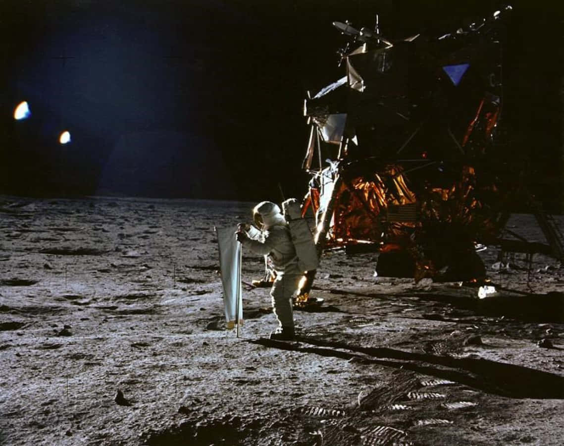 Astronaut Buzz Aldrin walking on the Moon Surface during historic Moon Landing of Apollo 11 mission.