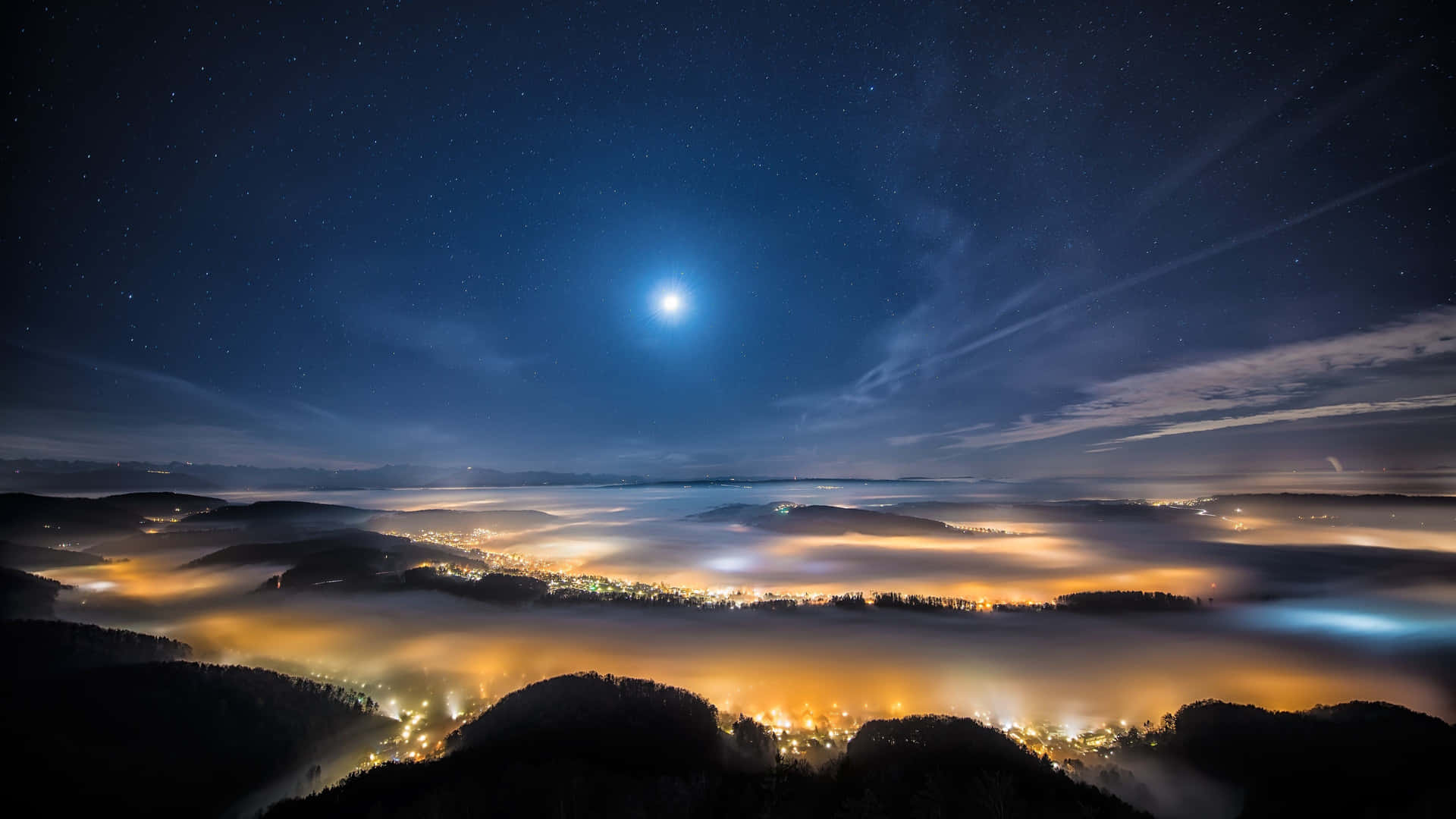 Moonlit_ Valley_ Under_ Starlit_ Sky Wallpaper