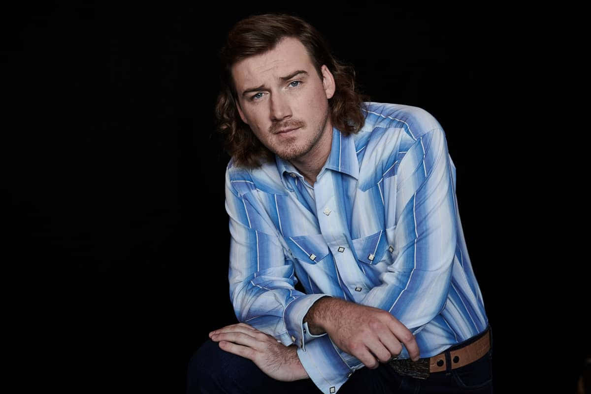Country artist, Morgan Wallen, on stage performing