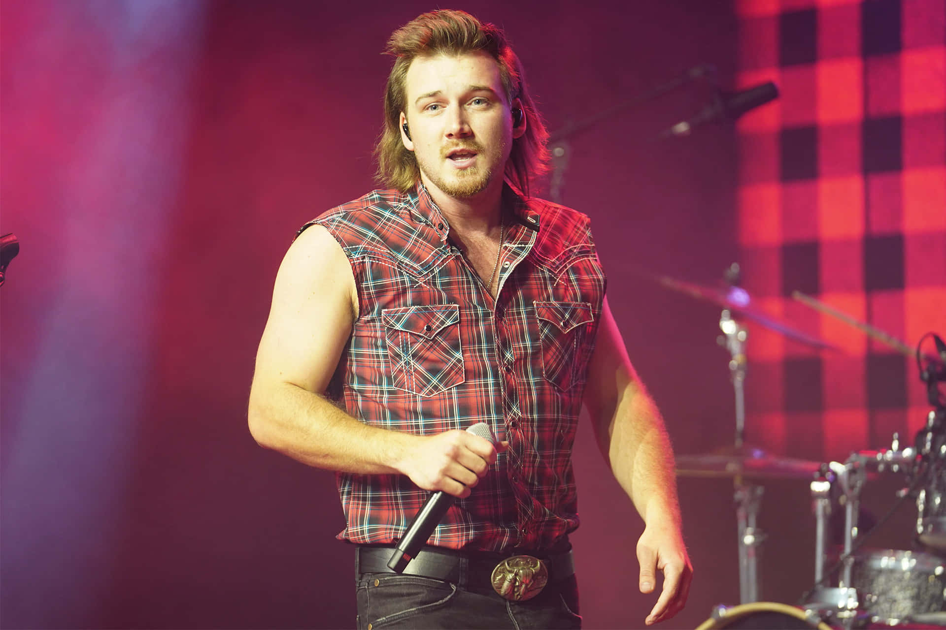 Download Country Music Sensation Morgan Wallen Looks On With A Cowboy