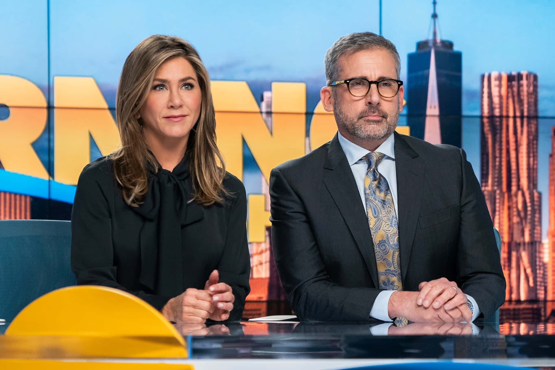 Morning Show Hosts Behind Desk Wallpaper