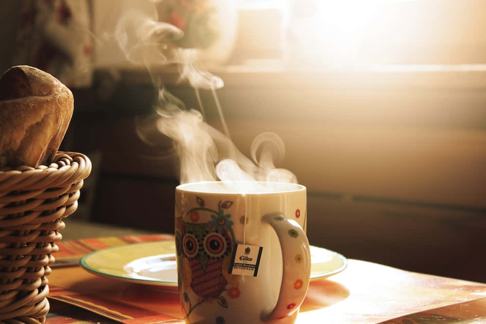 A Coffee Cup With Steam Rising From It