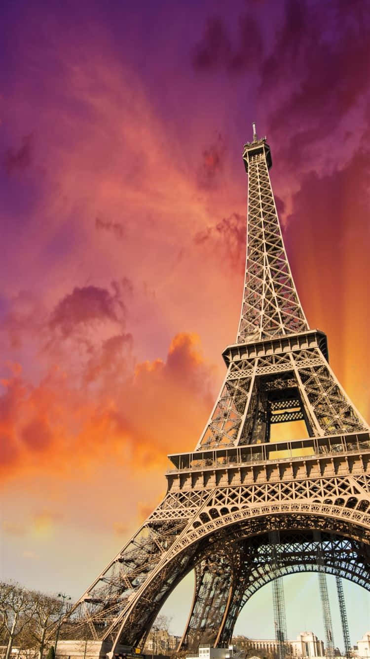The Eiffel Tower Is Seen In The Sunset Wallpaper