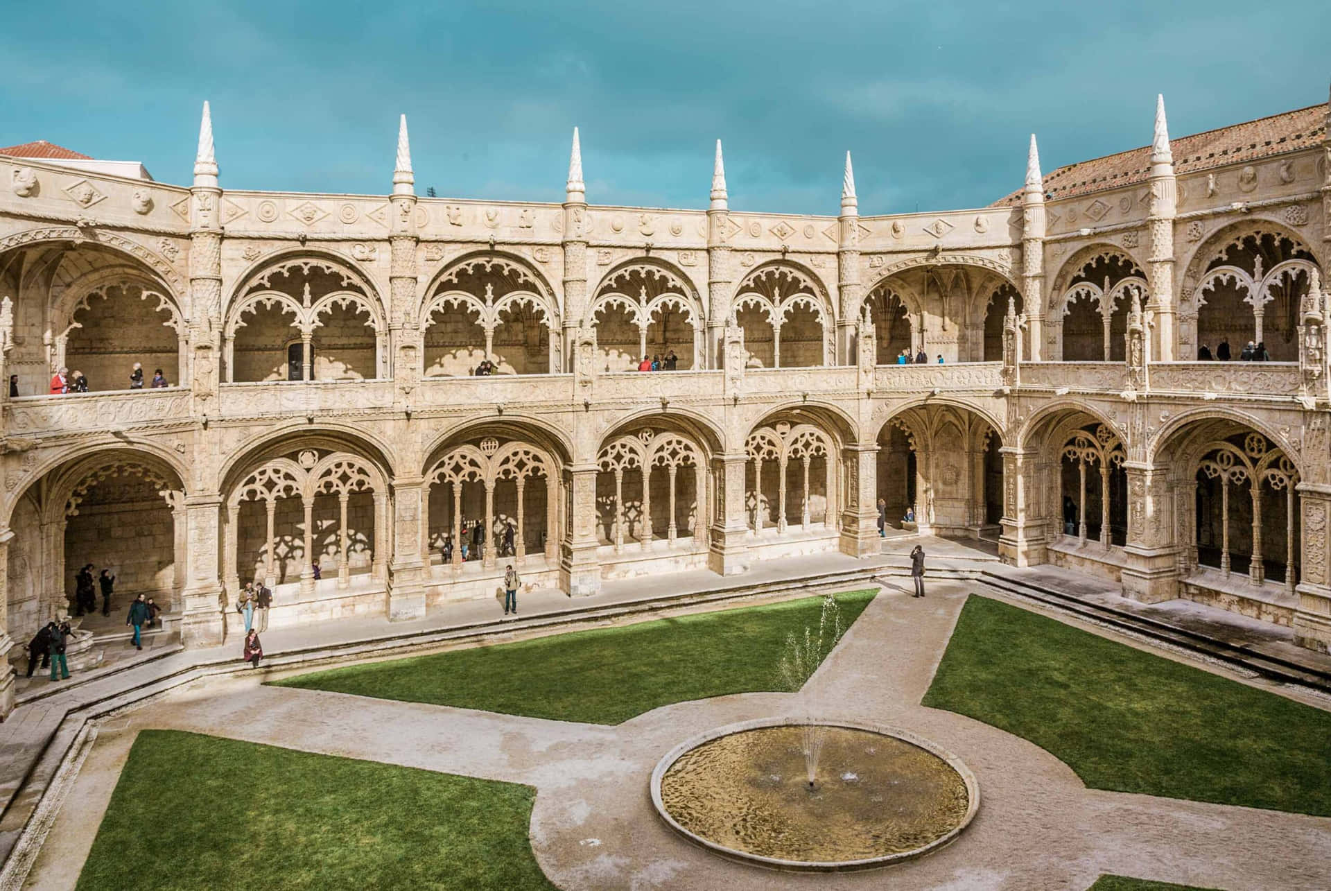 Caption: Mosteiro dos Jeronimos Inner Courtyard - Architectural Marvel in Portugal Wallpaper