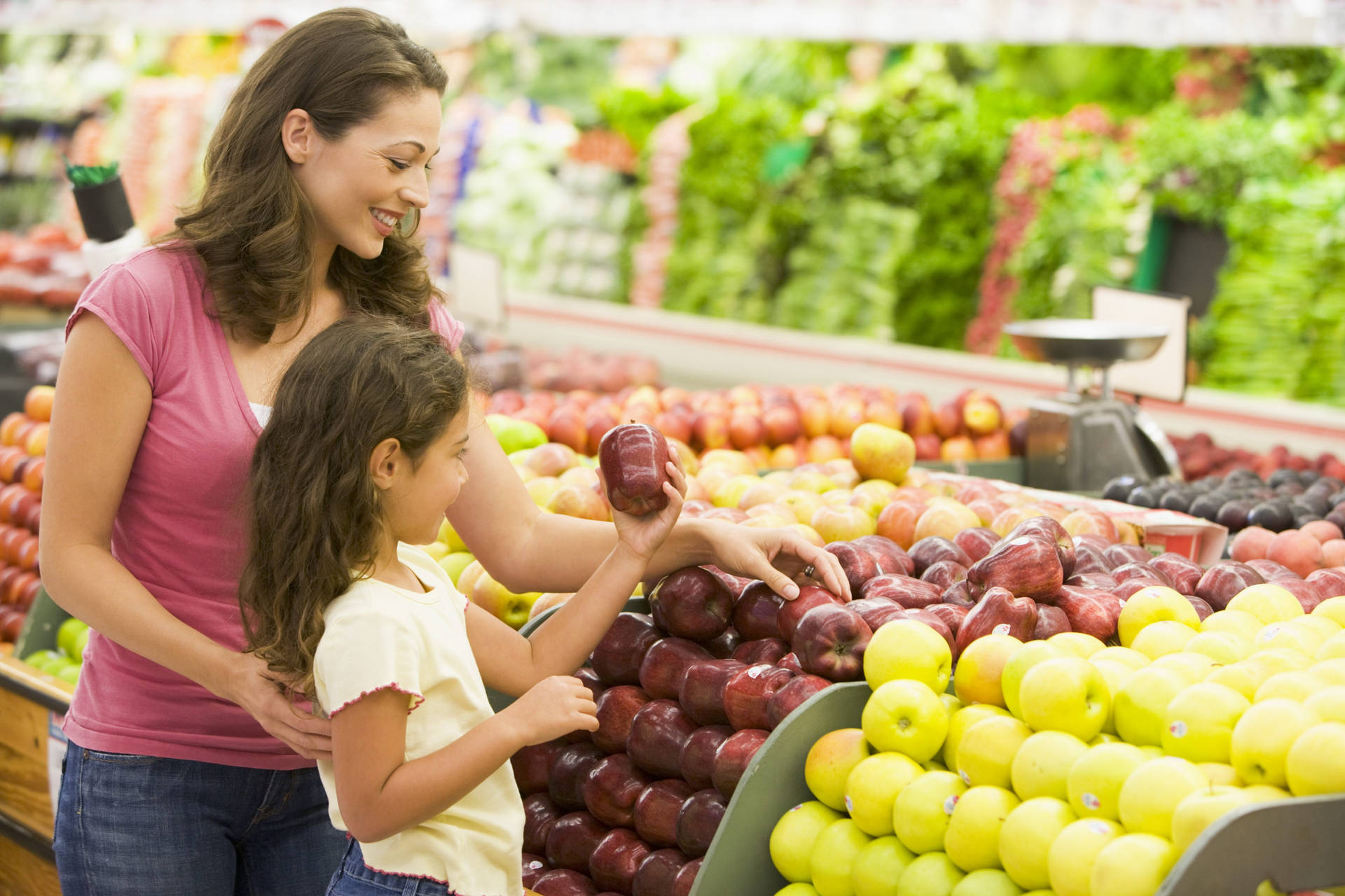 Mother About To Purchase Fruits Background