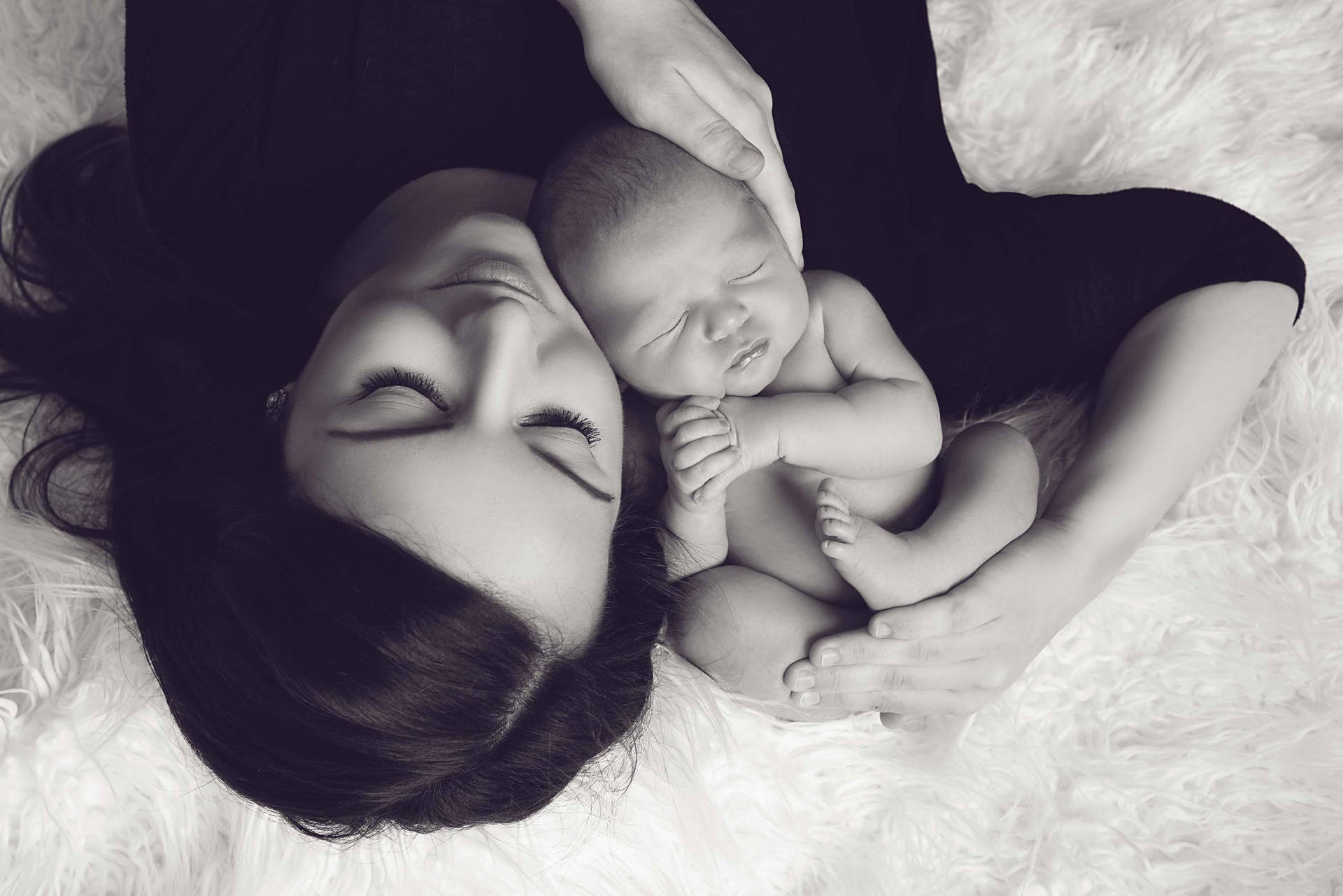 Mother And Baby In Bed Wallpaper