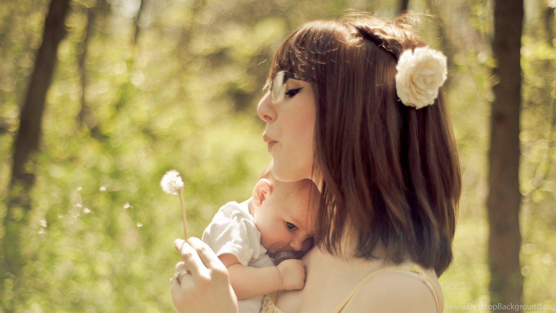 Mother And Baby With Flower Wallpaper