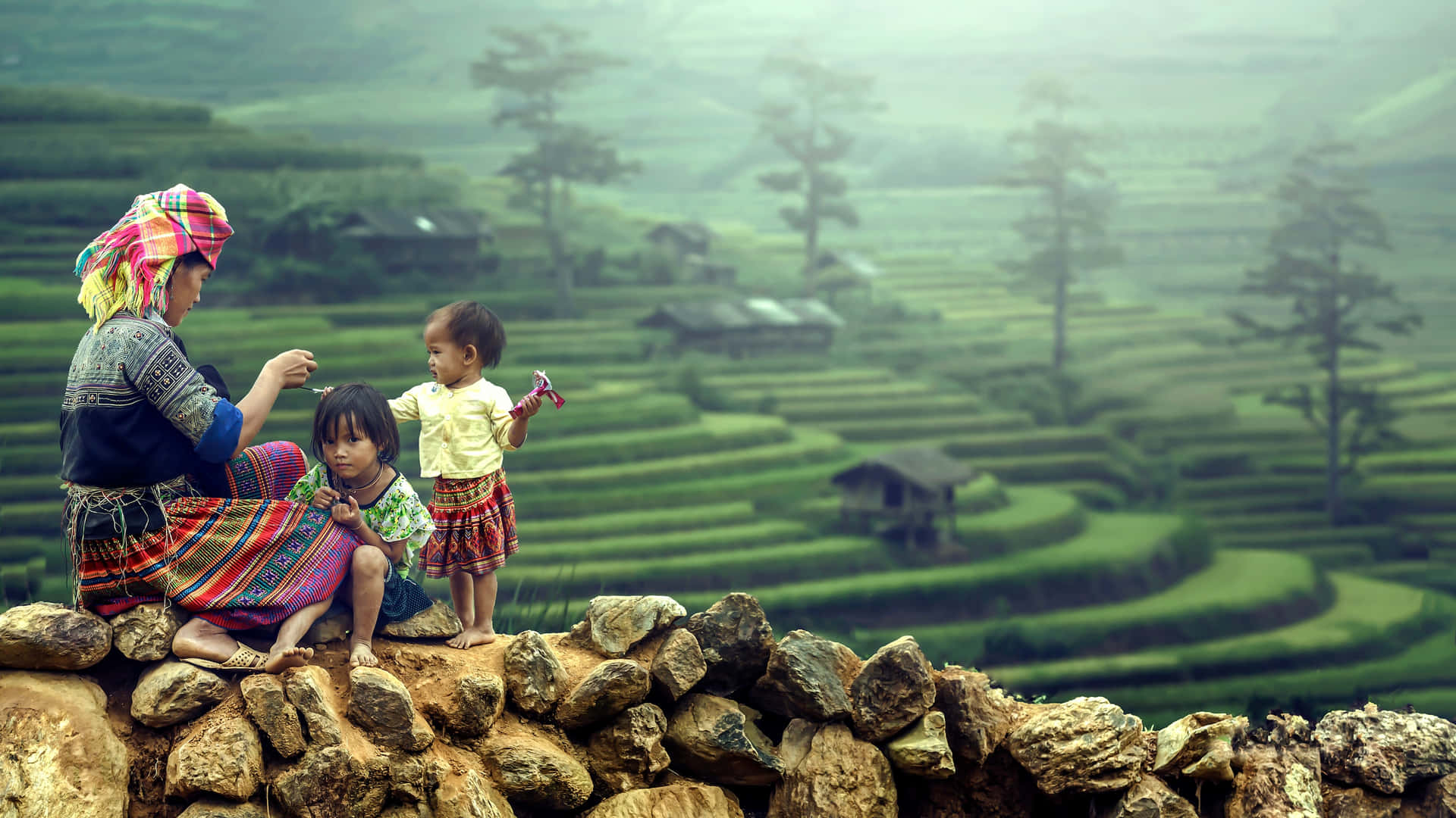 Mother and Children amidst Banaue Rice Terraces Wallpaper