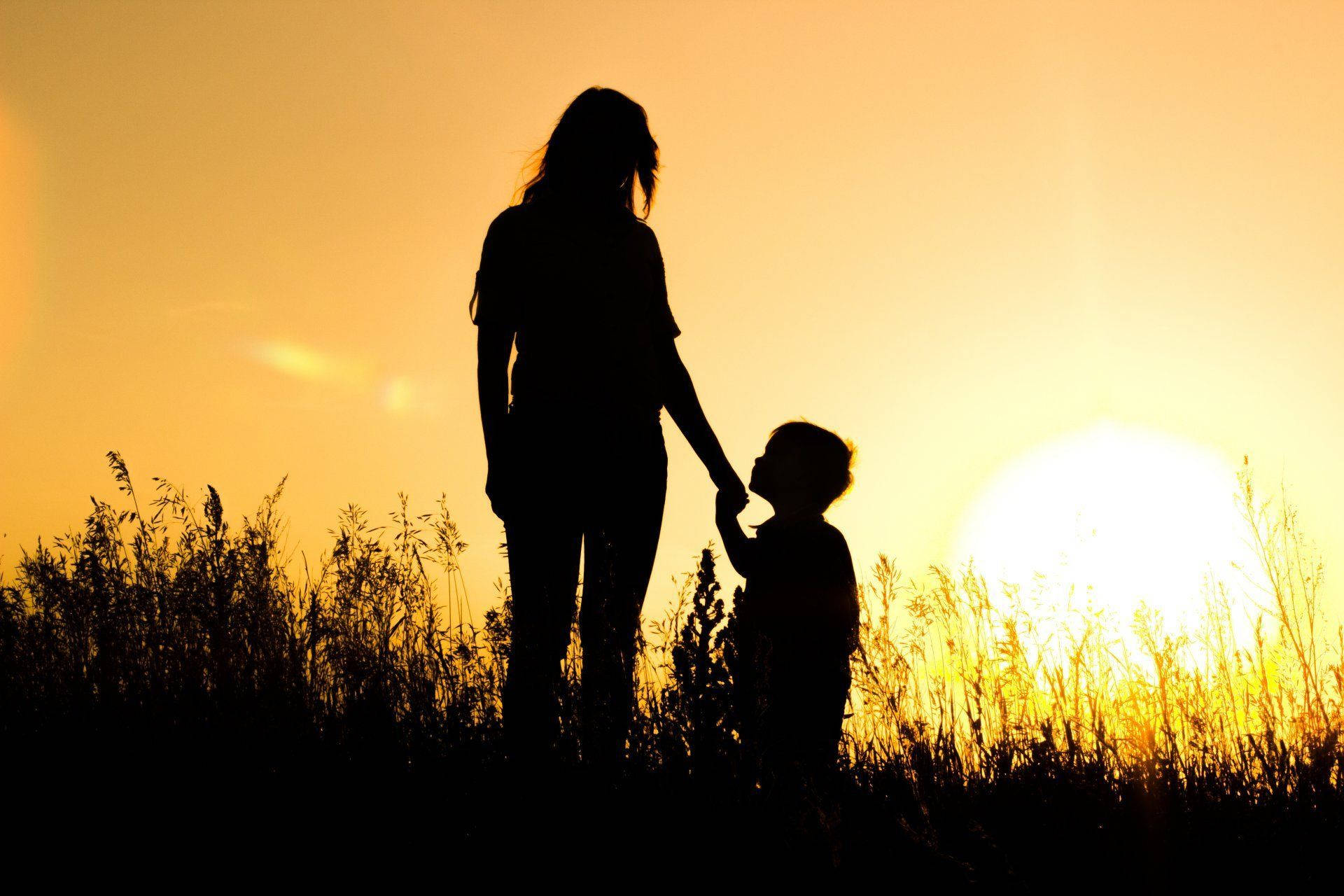 Mother And Son Sunset Silhouette Wallpaper