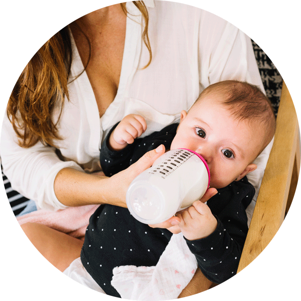 download-mother-feeding-baby-with-bottle-wallpapers