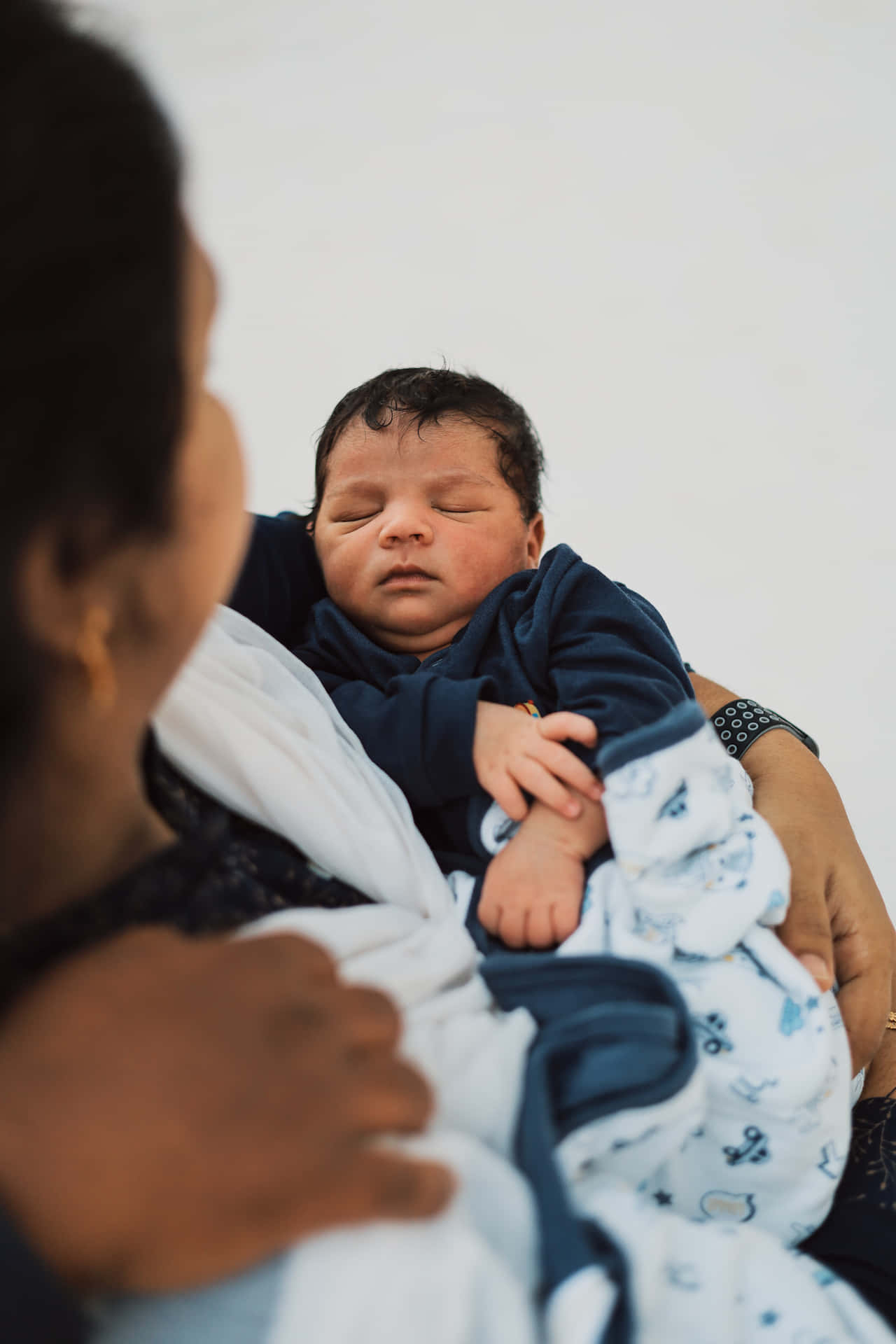 Motherhood Embrace Newborn Baby Wallpaper