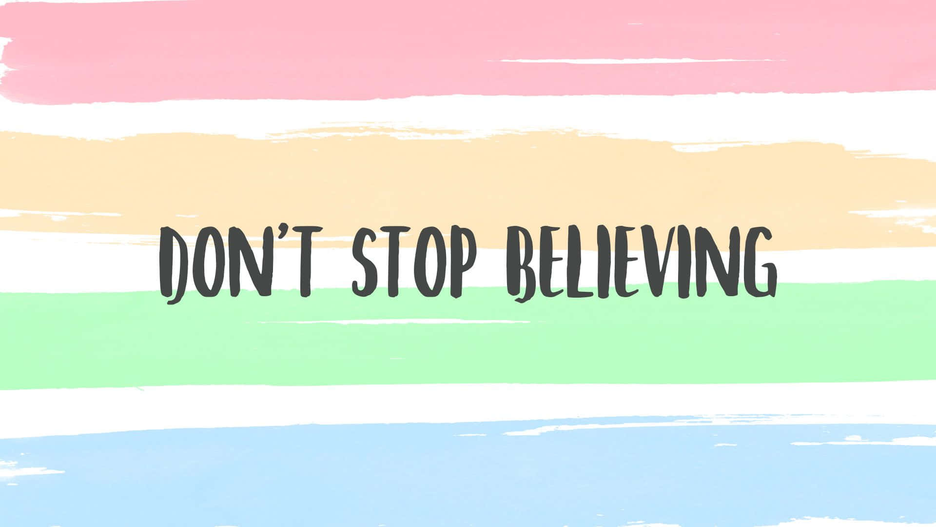 Don't Stop Believing - A Rainbow Colored Background With The Words Don't Stop Believing