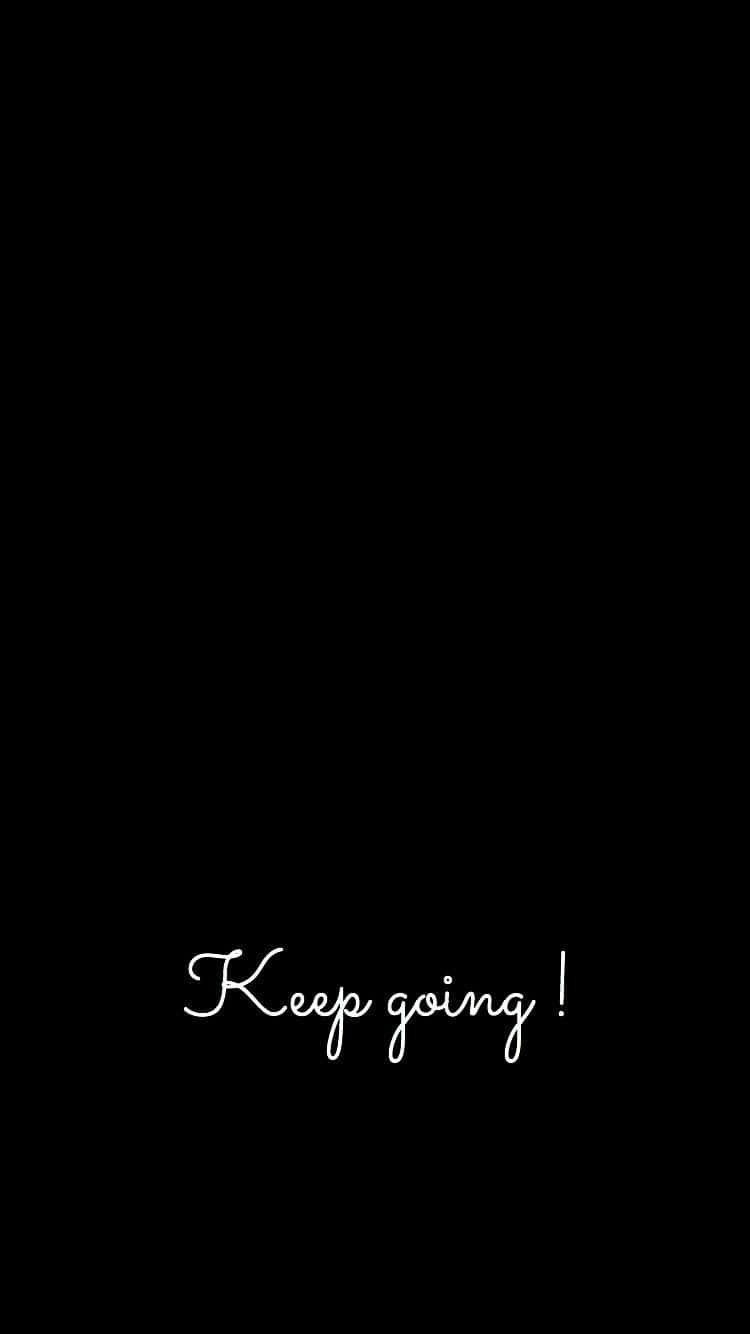 A Black Background With The Words Keep Going Wallpaper
