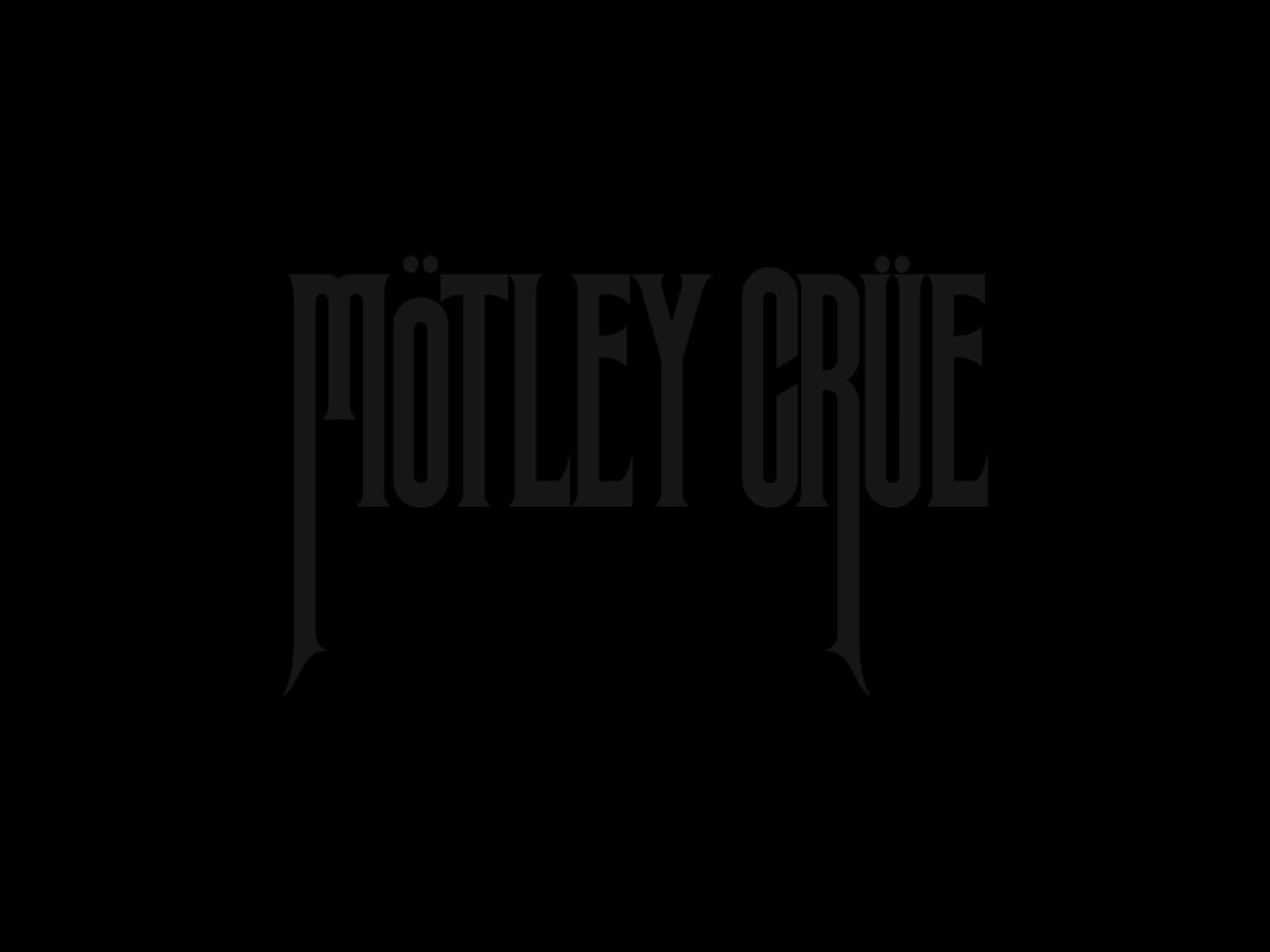 Motley Crue rocking the crowd at a sold-out stadium show Wallpaper