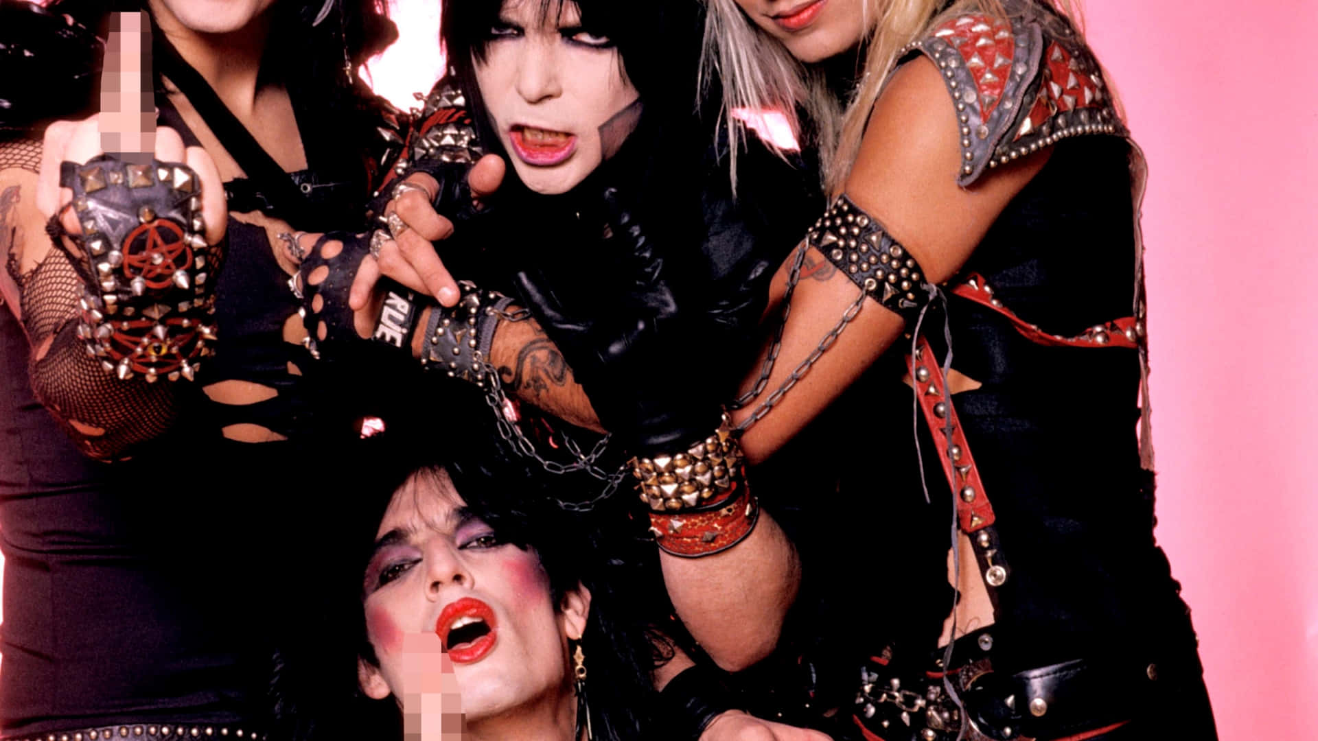 Four Women In Punk Outfits Posing For A Picture Wallpaper