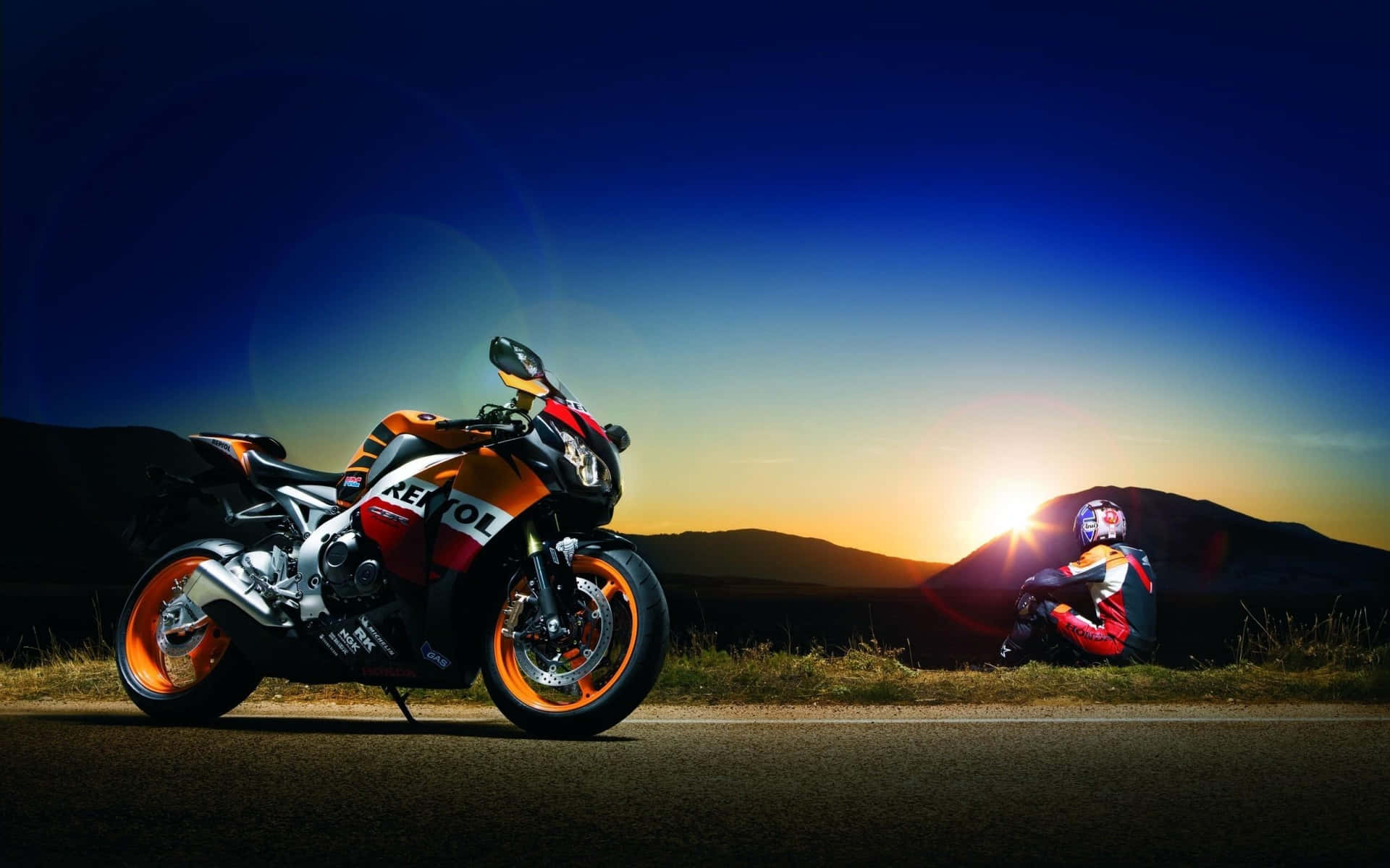 Moto G P Racerand Bikeat Sunset Wallpaper