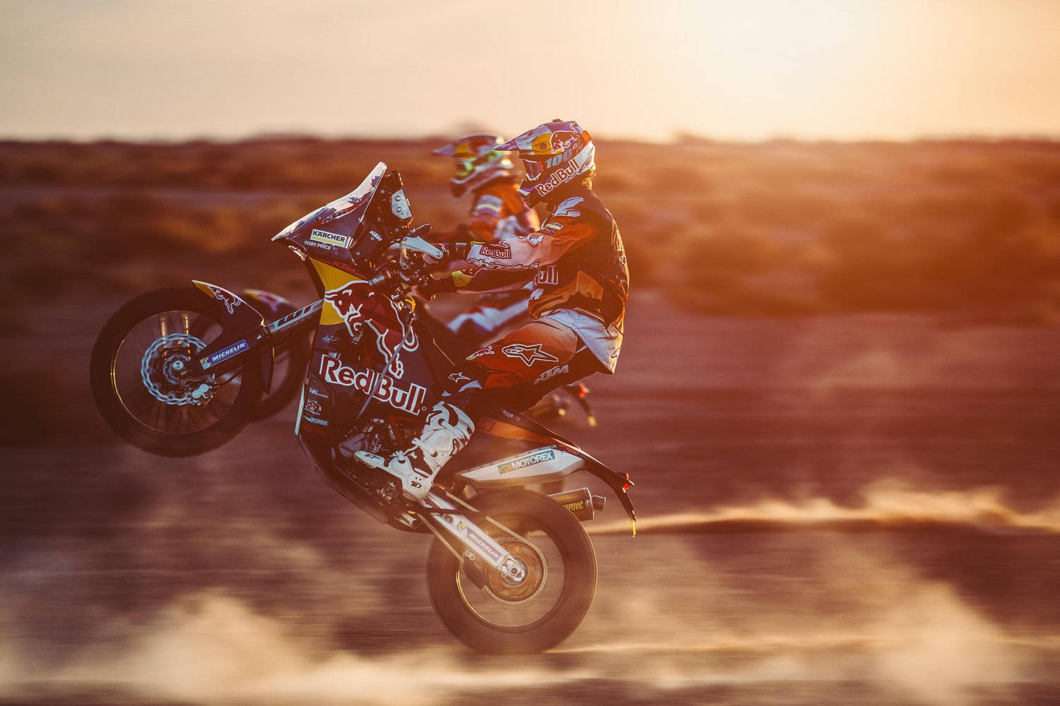 Motocross During Sunset In Dakar