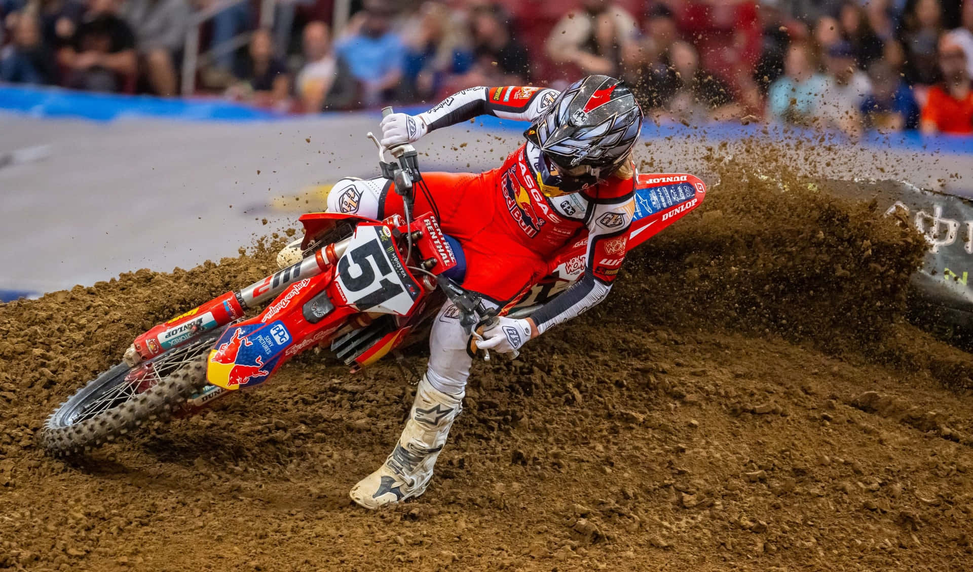 Motocross Racer Cornering Action Wallpaper