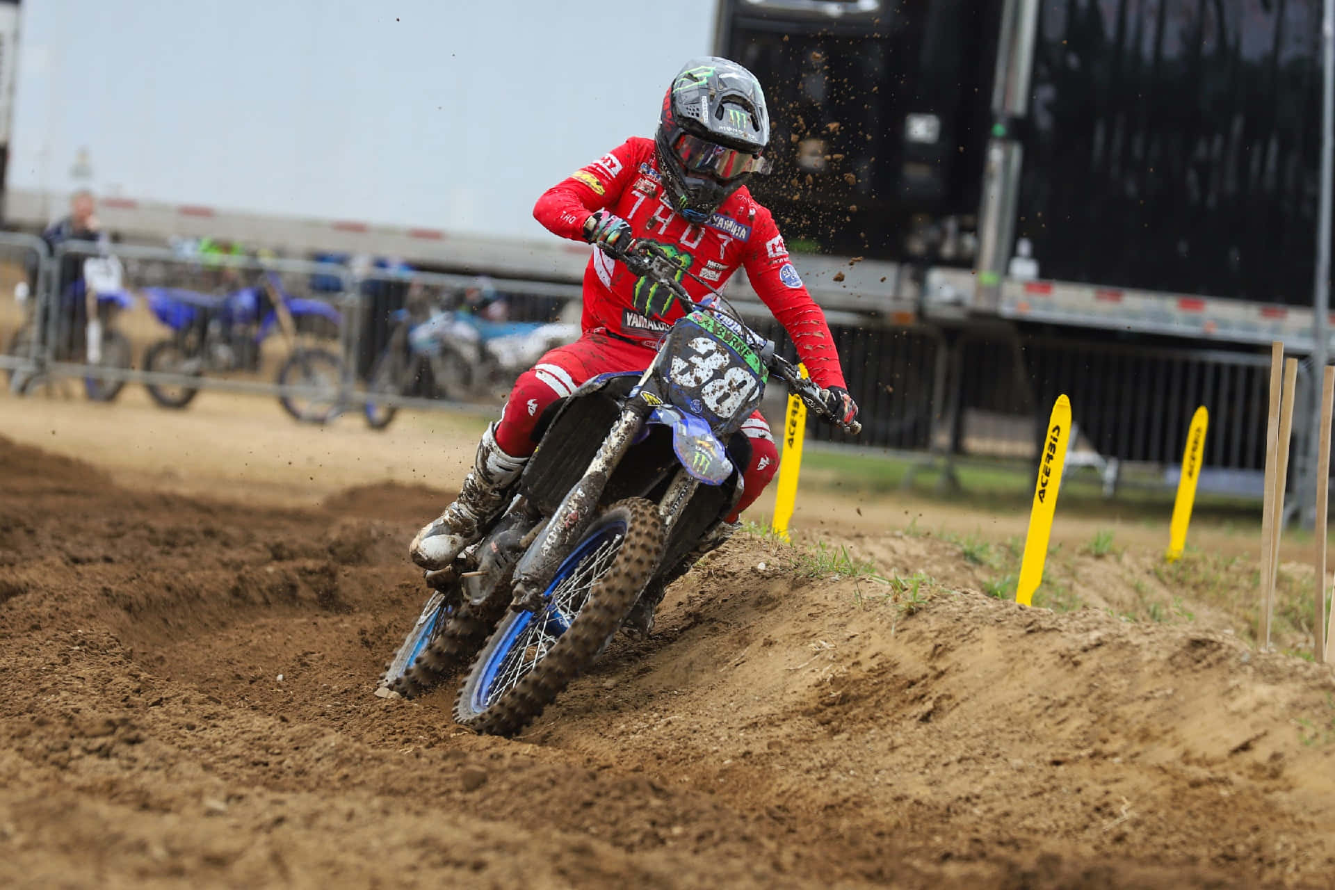 Motocross Racer Cornering Action Wallpaper