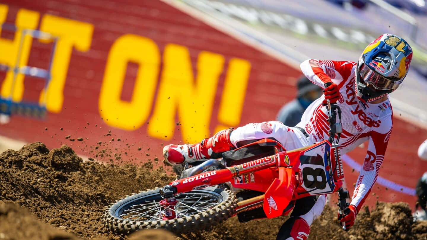 Motocross Racer Jett Lawrence Action Shot Wallpaper