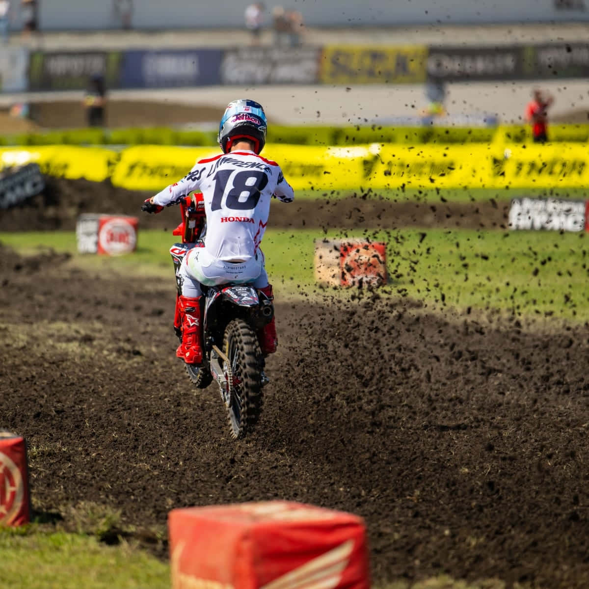 Motocross Racer Jett Lawrence Action Shot Wallpaper