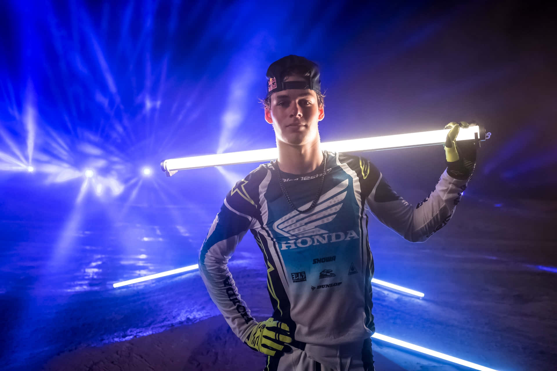 Motocross Rider Jett Lawrencewith Lightsaber Wallpaper