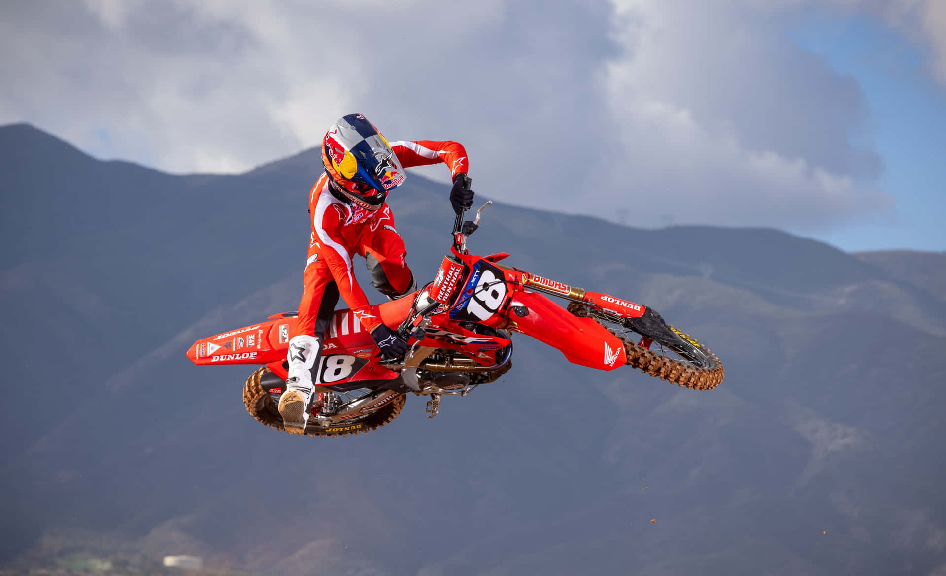 Motocross Rider Midair Stunt Wallpaper