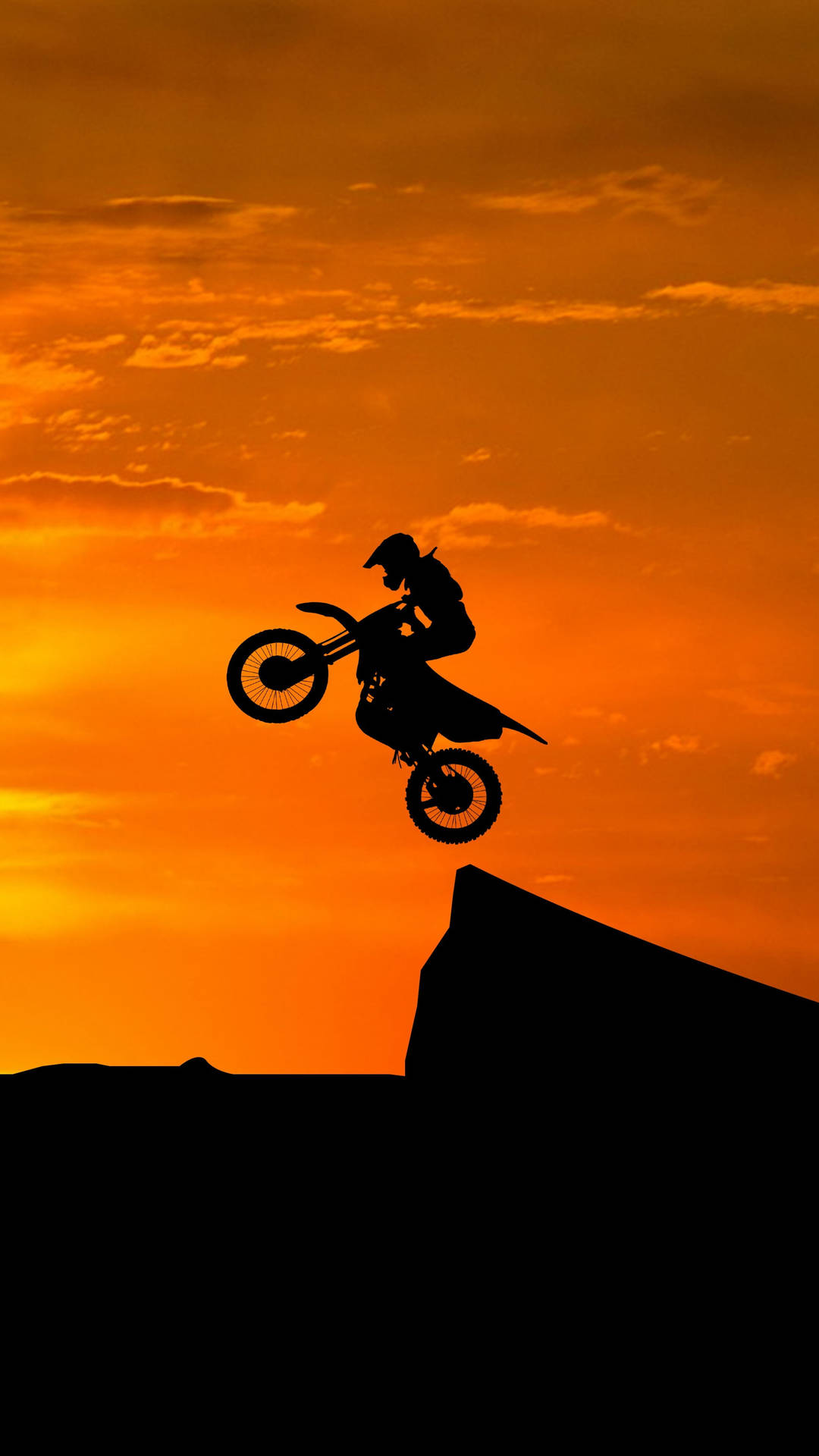 Motocross Sunset Jump Background