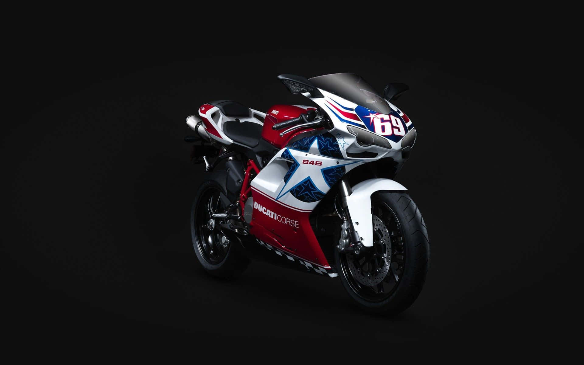 A Motorcycle With A Red, White And Blue Design