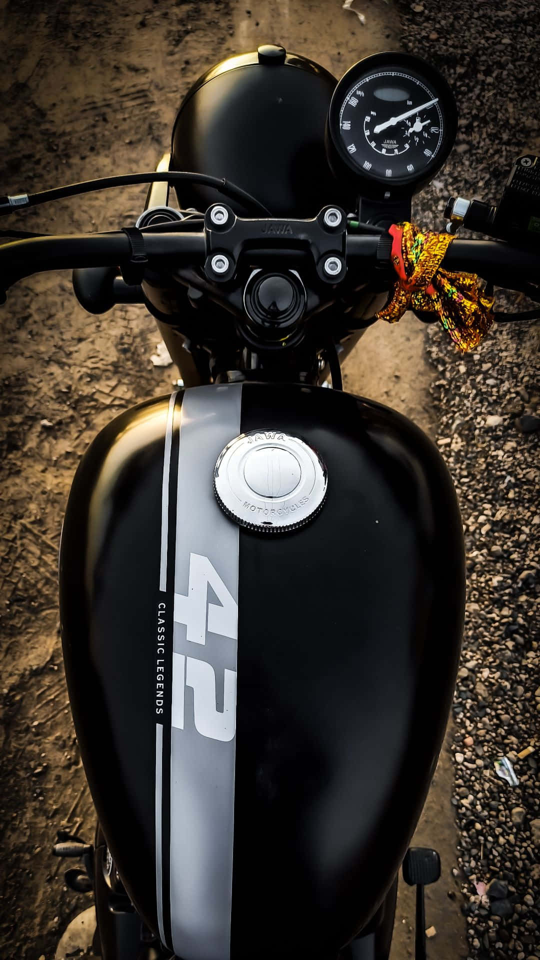 Experience Rugged Adventure on the Open Road with a Motorcycle iPhone Wallpaper