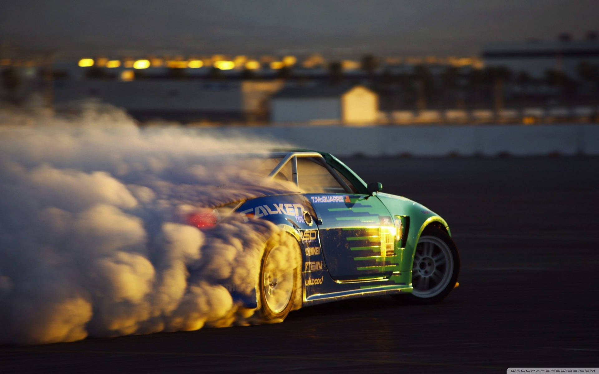 Motorsport Car Sideways Drifting With Smoke Wallpaper