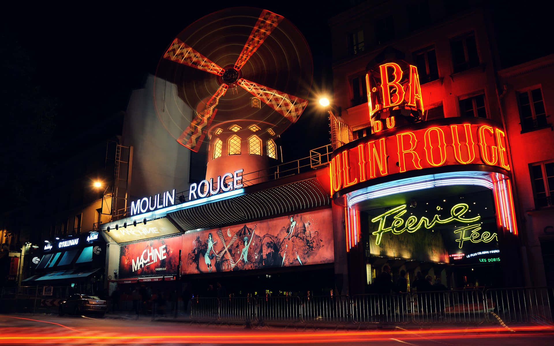 Moulin Rouge Bustling With Customers Wallpaper